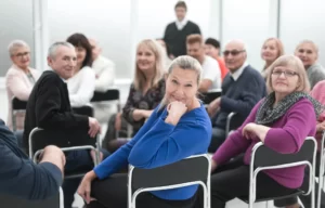 A group of adults have been discussing important things.
