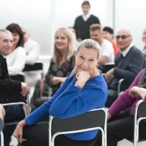 A group of adults have been discussing important things.